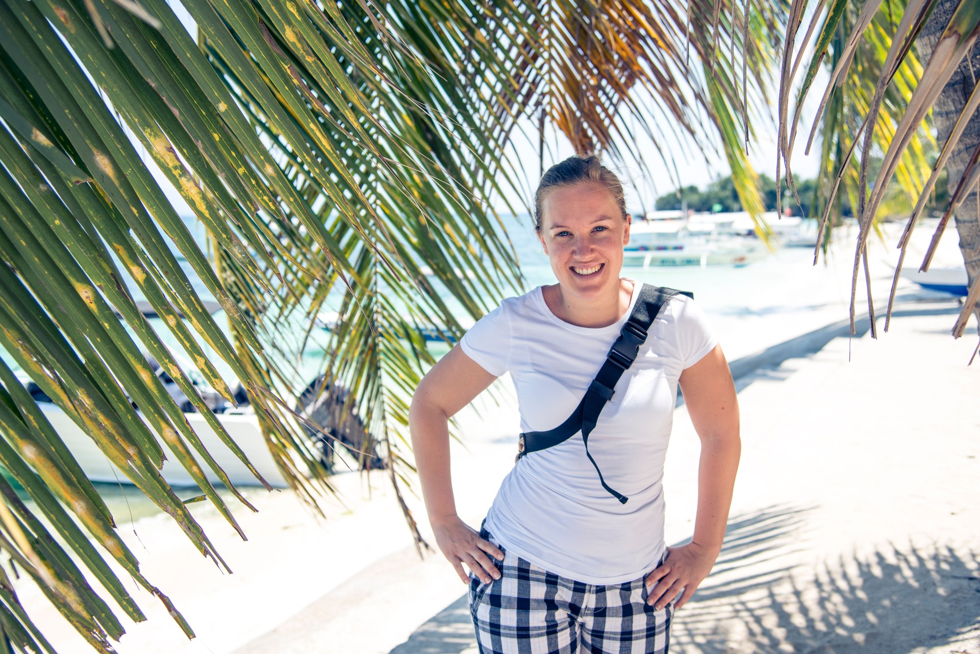 Tourist under the palm tree